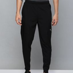 Puma Men Black Brand Logo Printed Tapered Fit Drycell Track Pants-image-58