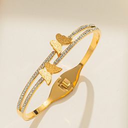 GOLDIWALA Gold-Plated Stainless Steel Cubic Zirconia Studded Bangle-Style Bracelet-26