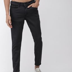 HIGHLANDER Men Black Tapered Fit Mid-Rise Clean Look Stretchable Jeans-image-61