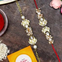Karatcart Gold-Plated Pearl Handmade Kundan Rakhi, Roli & Chawal for Bhai & Bhabi - Set of 2-31