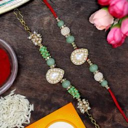 Karatcart Gold-Plated Light Green Crystal Kundan Rakhi, Roli & Chawal for Bhai & Bhabi - Set of 2-7