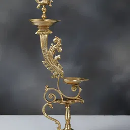 Exotic India Gold Toned Designer Peacock Lamp in Brass-image-23
