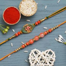 eCraftIndia Swastika & Pearl Rakhis with Roli Chawal Pack - Set of 2-18