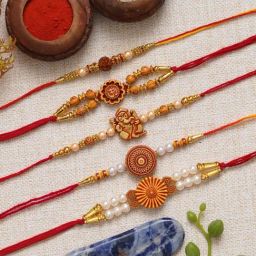 eCraftIndia Multicolor Rudraksha, Om, Ganesha, Flower, Pearl Rakhis with Roli Chawal Pack - Set of 5-9