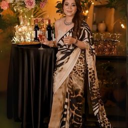 ODETTE Cream And Brown Animal Print Saree For Women-image-60