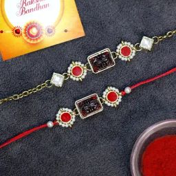 Karatcart Gold-Plated Red Carved Stone Kundan Rakhi, Roli & Chawal for Bhai & Bhabi - Set of 2-1
