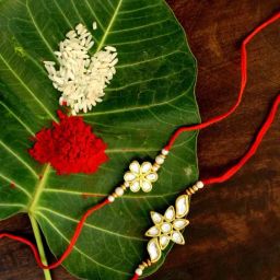 Karatcart Gold-Plated Kundan Rakhi with Roli Chawal & Greeting Card for Brother - Set of 2-97