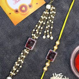 Karatcart Gold-Plated Red Carved Stone Kundan Rakhi, Roli & Chawal for Bhai & Bhabi - Set of 2-3