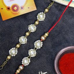 Karatcart Gold-Plated Golden Pearl Handmade Kundan Rakhi, Roli & Chawal for Bhai & Bhabi - Set of 2-9