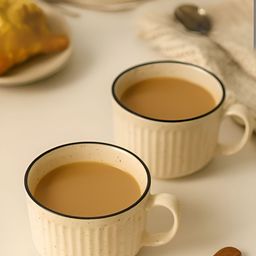 Unravel India 2 Piece White & Black Hand Painted Ceramic Matte Mugs-image-10