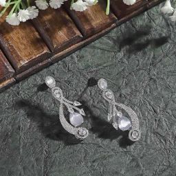 Zeneme Rhodium Plated Silver Toned Blue AD Quirky Drop Earrings-9