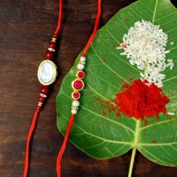Karatcart Gold-Plated Kundan Rakhi with Roli Chawal & Greeting Card for Brother - Set of 2-34