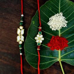 Karatcart Gold-Plated Kundan Rakhi with Roli Chawal & Greeting Card for Brother - Set of 2-1