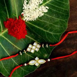 Karatcart Gold-Plated Kundan Rakhi with Roli Chawal & Greeting Card for Brother - Set of 2-image-86