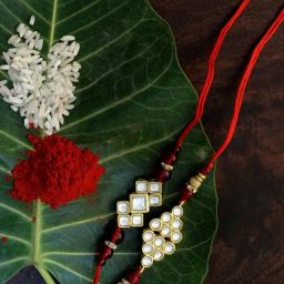 Karatcart Gold-Plated Kundan Rakhi with Roli Chawal & Greeting Card for Brother - Set of 2-image-79