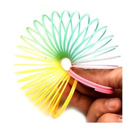 VGRASSP Rainbow Circle Folding Plastic Spring Coil Funny Magic Toy Slinkier Classic and Colorful Slinky Neon Plastic Magic Glow - Multicolor (Color As Per Stock) image 5