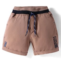 Olio Kids Cotton Knit Above Knee Length Shorts with Text Print - Tan-image-45