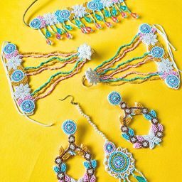 Sangria Gold-Plated Floral Beaded Boho Tasseled Bridal Jewellery Set-image-67