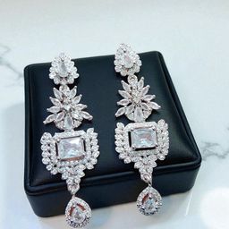 The Pari Rhodium-Plated American Diamond Studded Square Shaped Drop Earrings-image-90