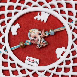eCraftIndia Stone Studded Lord Ganesha Design Thread Rakhi-image-63