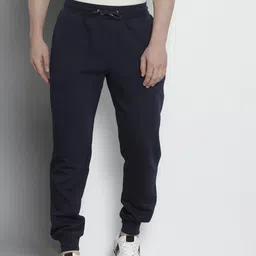 Tommy Hilfiger Men Solid Regular Fit Mid-Rise Joggers-image-31