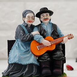 Webelkart Blue & Black Citizen Playing Instrument Couple Showpiece-image-14