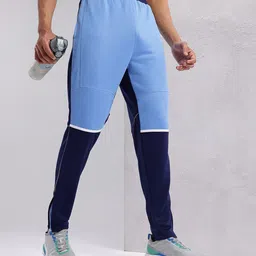 HRX by Hrithik Roshan Men Colourblocked Zipped Hem Rapid-Dry Running Track Pants-image-69
