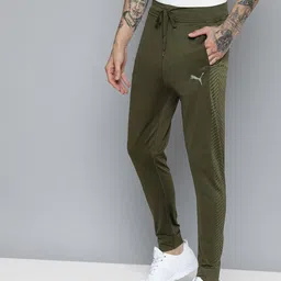 Puma Men Olive Green Brand Logo Printed Slim Fit dryCELL Formknit Seamless Jogger-image-58