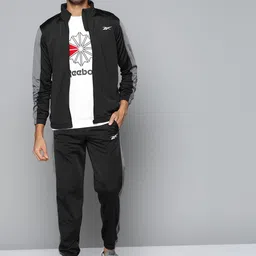 Reebok Men Black Solid Workout Tricot Tracksuits-image-33