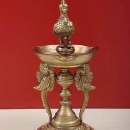 Exotic India Gold Toned Three Wicks Peacock Lamp Brass Pooja Essentials-image-43