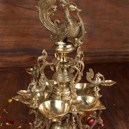 Exotic India Gold Toned Brass Peacock Pooja Diyas-image-74