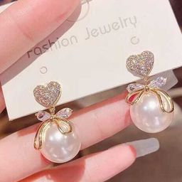 Celestique Gold-Plated Stone Studded Contemporary Drop Earrings-2