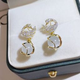 Celestique Pearl & Opal Studded Swan Drop Earrings-image-98