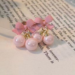VAGHBHATT Gold-Plated Pearls Studded Bow Shaped Studs image 3