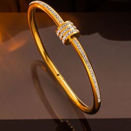 Designs & You Stainless Steel American Diamond GoldPlated Bangle Style Bracelet-image-24
