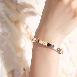 Jewels Galaxy Women Rose Gold Plated & White American Diamond Bangle-Style Bracelet-50