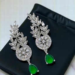 The Pari Rhodium-Plated American Diamond Studded Teardrop Shaped Drop Earrings-image-96