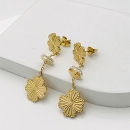 ANJNI CREATION Gold-Plated Cubic Zirconia Stone Studded Contemporary Shaped Drop Earrings-33