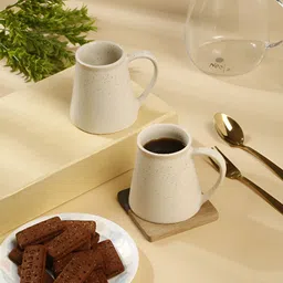 Myntra Elegant Homes Cream-Coloured & Black Textured Ceramic Matte Mugs Set of Cups and Mugs-1