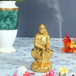HANDICRAFTS PARADISE Gold-Toned Sai baba seated on a rock Metal Showpiece-image-28