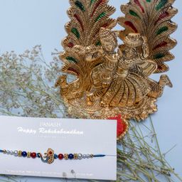 PANASH Gold-Plated Beaded Rakhi Radha Krishna & Roli Chawal Gift Set-image-6