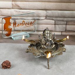 Two Moustaches Gold Toned Textured Ganesha On Lotus With Three Leaf Design Diya-11
