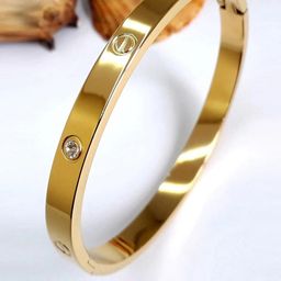 Designs By Jewels Galaxy Women Gold-Toned & White American Diamond Gold-Plated Bangle-Style Bracelet-19