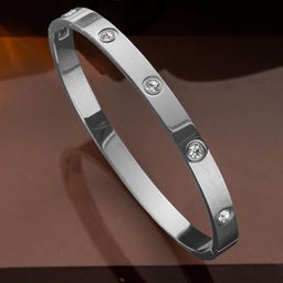 Designs & You Silver Plated Stainless Steel American Diamond Studded Bangle Style Bracelet-8