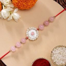 Karatcart Stylish Pink Beads Handmade Meenakari Kundan Rakhi for Brother with Roli & Chawal-image-1