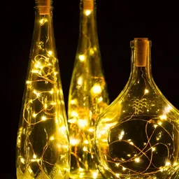 ENORMITY Set Of 4 Yellow Rice Shape String Lights image 1