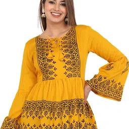 PRIYAGANI GARMENTS Women Printed Bell Sleeves Longline Top-11