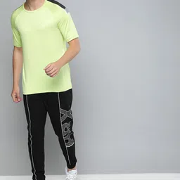 HRX By Hrithik Roshan Men Jet Black Solid Regular Fit Mid-Rise Bio-Wash Lifestyle Joggers image 2