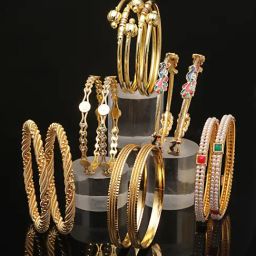 Zeneme Gold Plated & Gold Toned Stone & Pearl Studded Bangles for Women Set of 12-15