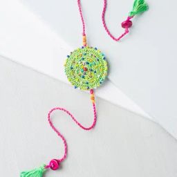 Fabindia Green & Pink Thread Rakhi-image-98